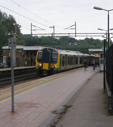 The following 07.42 London Midland service to Birmigham New Street via Northampton draws up at Berkhamsted's Platform 3 formed of 350.247.