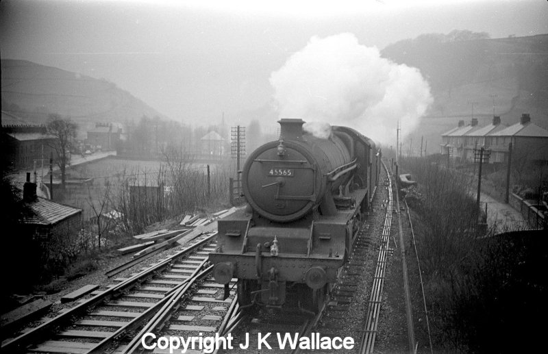 LMS Jubilee 45565 'Victoria' approaches Dover Bridge signal box with an eastbound passenger train in the early 1960s.