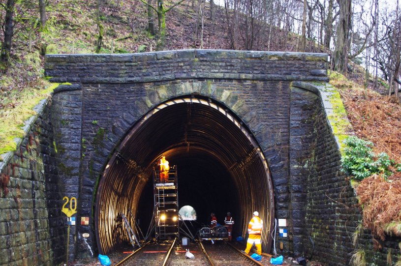 Holme Tunnel southern portal prior to work starting with 20 mph speed restriction sign still in place.