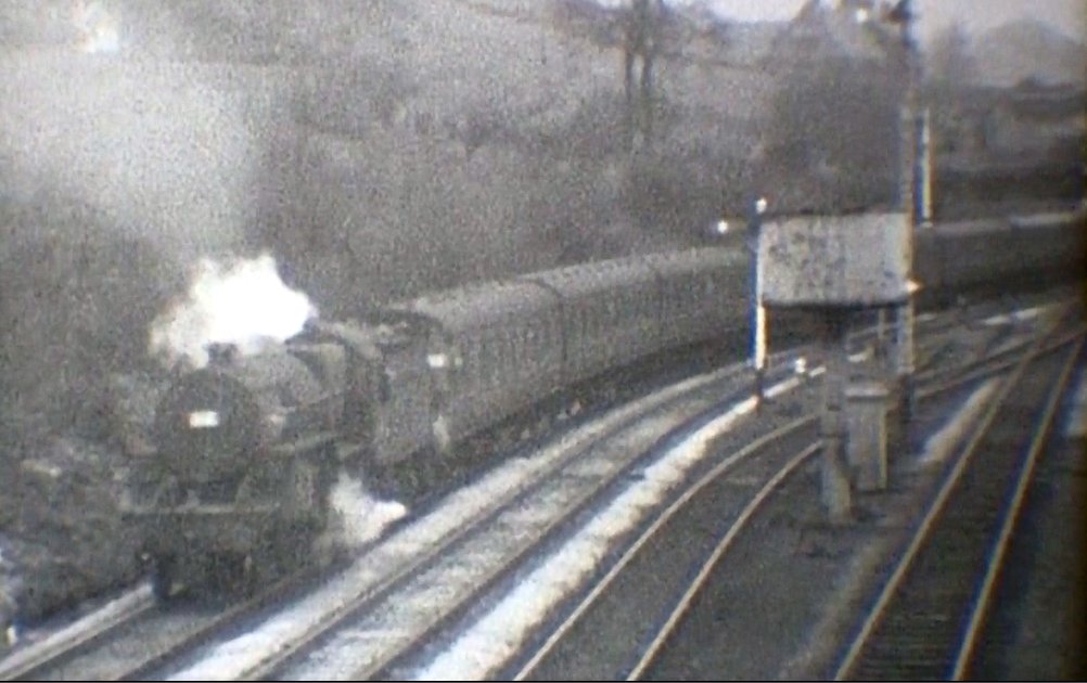 The Crab continues to propel the empty excursion stock towards Hall Royd Junction, courtesy 'Steam World' TeleRail video  and Richard Greenwood.