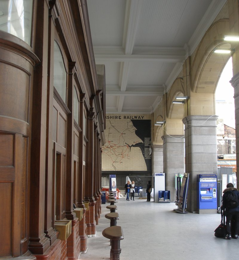 Manchester Victoria Railway Station 11 April 2015 on the occasion of a guided tour organised by the Lancashire & Yorkshire Railway Society: Booking Office exterior and L&YR tiled system map.
