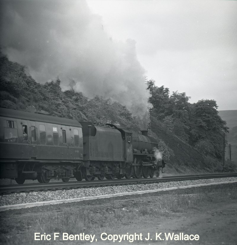 45697 Achillies working 1Z13 excursion to Blackpool North, Baird television Ltd at 09.15 on Saturday 10 June 1967 passing the site of Luddenden Foot station on the Calder Valley main line.