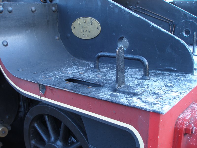 ex-LMS Stanier 8F 2-8-0 48624 as seen at the Great Central Railway, Loughborough on 30 December. Detail of front footplate step and grab rail.