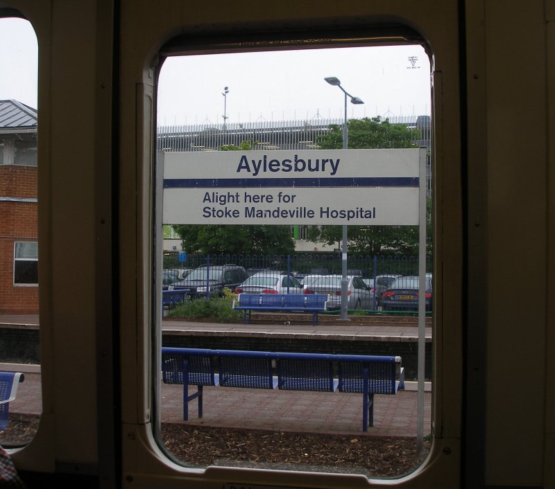 Aylesbury station sign as seen through the window of Class 121 W55034 on 18 May 2017/