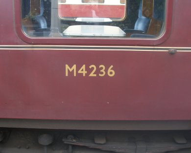Maroon livery lining and numbering details on a BR Mark 1 carriage at Sheringham 27 August 2016