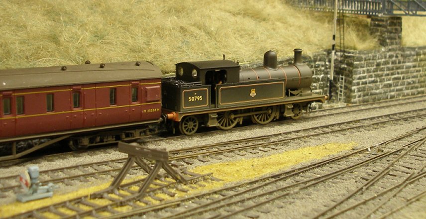 Bachmann L&YR 2-4-2T Radial Tank 50795 arrives at Hall Royd Junction off the Copy Pit line with ex-LMS compartment stock.