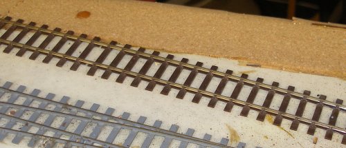 4mm C&L track laid on the base board, as bought