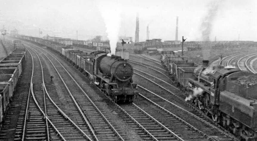 WD 2-8-0 passing new-build 75049 at Hall Royd Engineering sidings