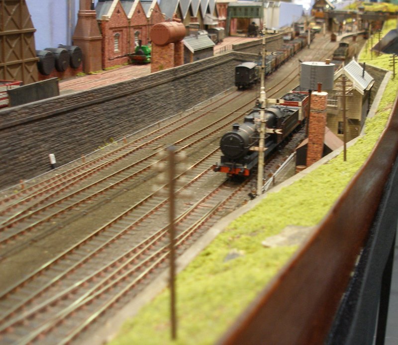 A 'big' L&YR 0-8-0 goods loco and tran sits in the Calderwood Up loop - a scene which was replicated up and down the Calder Valley in the 1890s.