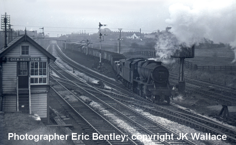 Stanier 8F 2-8-0 48534 (9K) Bolton leaving Chew Moor sidings Westhoughton on a pick up freight towards Bolton Bamfurlong – Halliwell (2 brake vans – 1  each end) 10.45 Sat 25 February 1967. Eric F Bentley; copyright JK Wallace