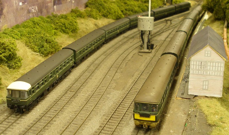 The Silver Fox Class 124 4mm model meets the Trix/Dapol 3.8mm at Hall Royd Junction.