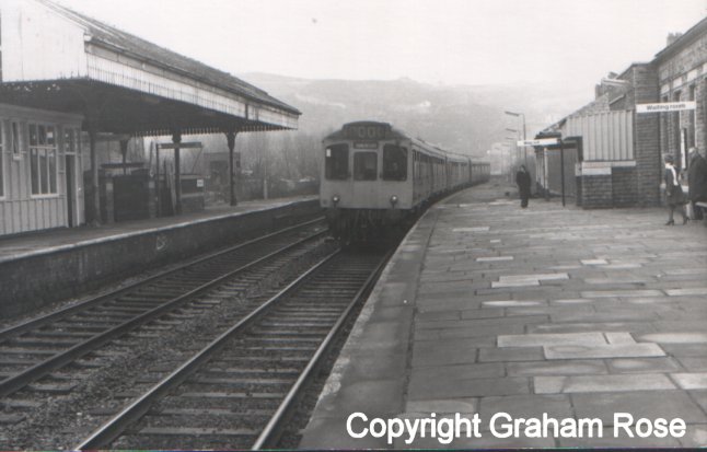 A 2 x 3-car Class 110 sets arrive at Todmorden, heading for Manchester Victoria on a wet day in the 1980s.