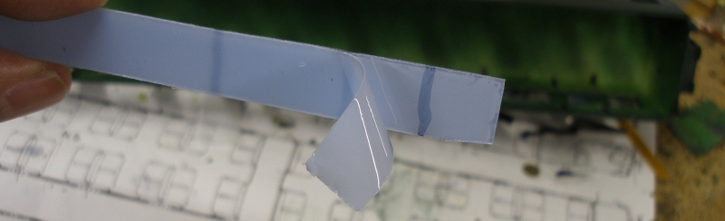 4mm scale Sliver Fox Class 124 Trans-Pennine DMU:  glazing strip showing clear protective film being removed