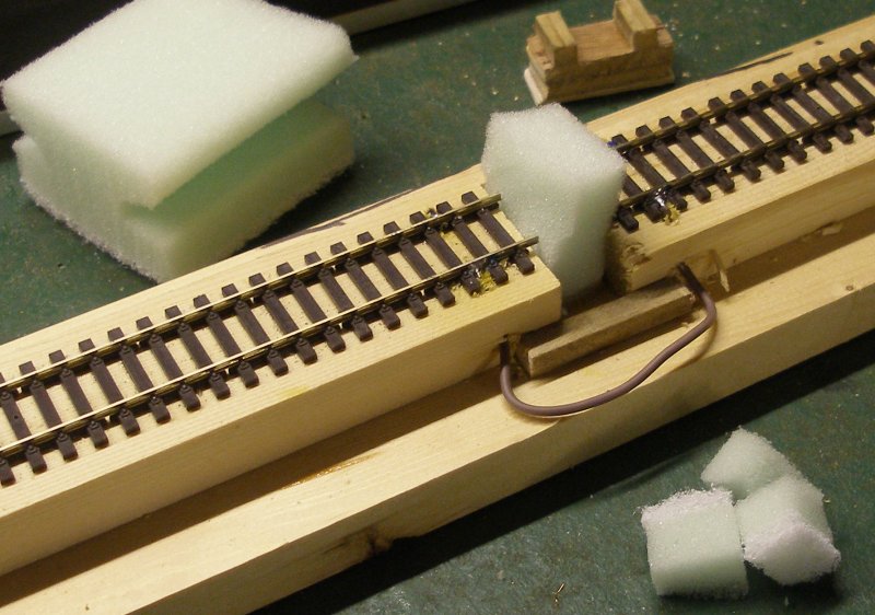 Construction of an OO gauge locomotive wheel cleaning track: kitchen cleaning pad