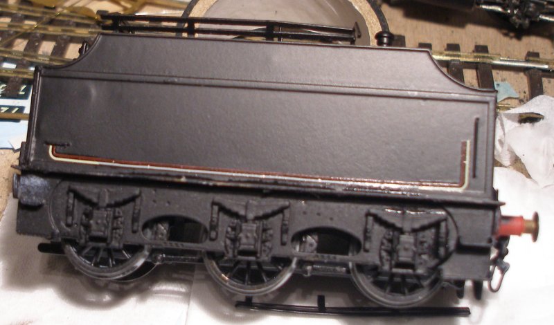 Model railway varnishes failed completely and the tender of the DJH Crab has been stripped back to bare metal, and the body resprayed using Halford's matt black car spray. The second set of lining transfers are being applied.