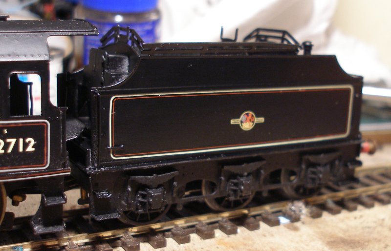 Three quarters front view of a 4mm (OO) DJH Fowler tender as attached to a Crab 2-6-0 in late BR mixed traffic livery with Fox Transfers and varnished with Ronseal Satin varnish.
