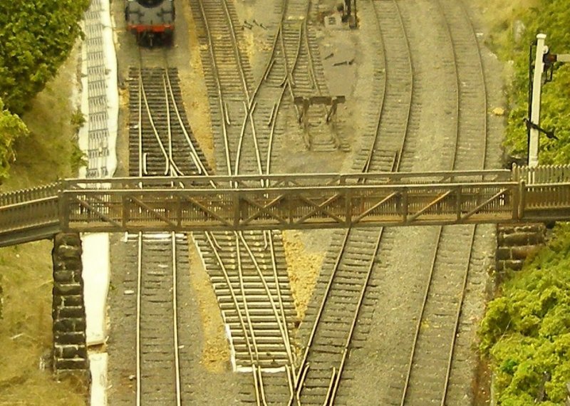 Hall Royd Junction model railway layout: the new 60 inch cross-over is laid in and wired, and is being tested by a loco