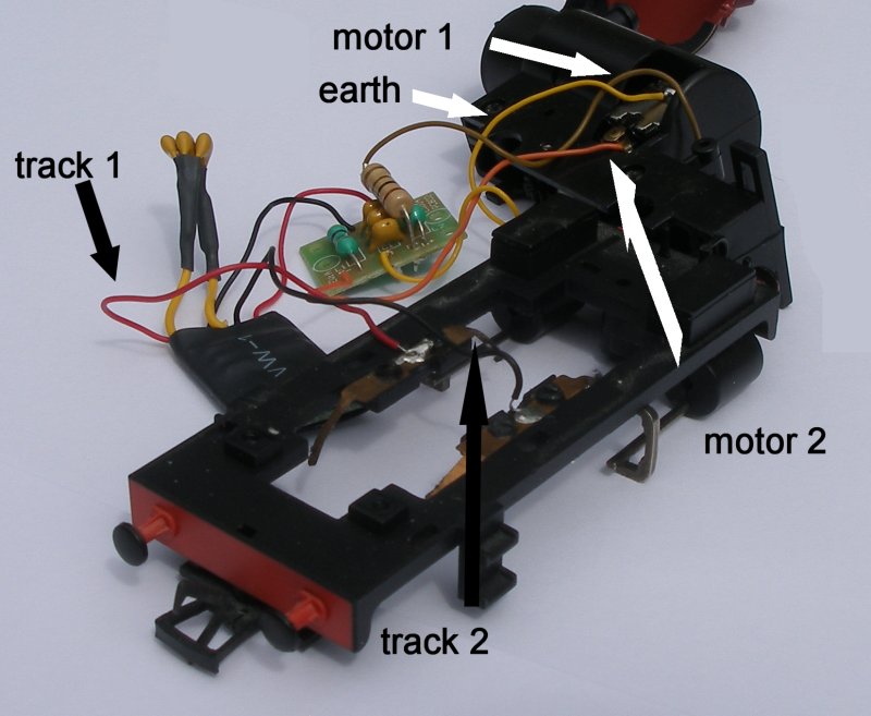 Bachmann 'Greg' DCC starter set 0-4-0 OO gauge loco showing internal wiring and decoder as fitted, and with the fifth yellow wire connecting the circuit board to the motor casing, with wires marked up.