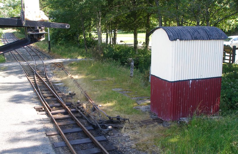 The lever frame hut, Llangower, Bala Lake Railway, 16 July 2015 containing a 4-lever Dutton lever frame stamped L&SWR.