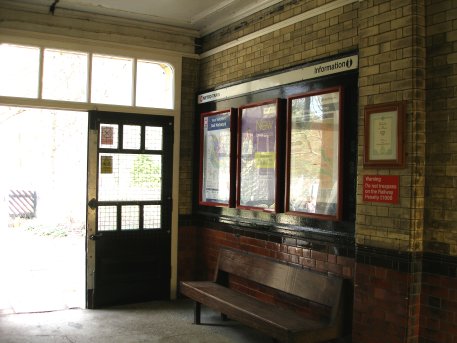 Interior of the booking hall at Hebden Bridge railway station looking towards the forecourt on 19 April 2013