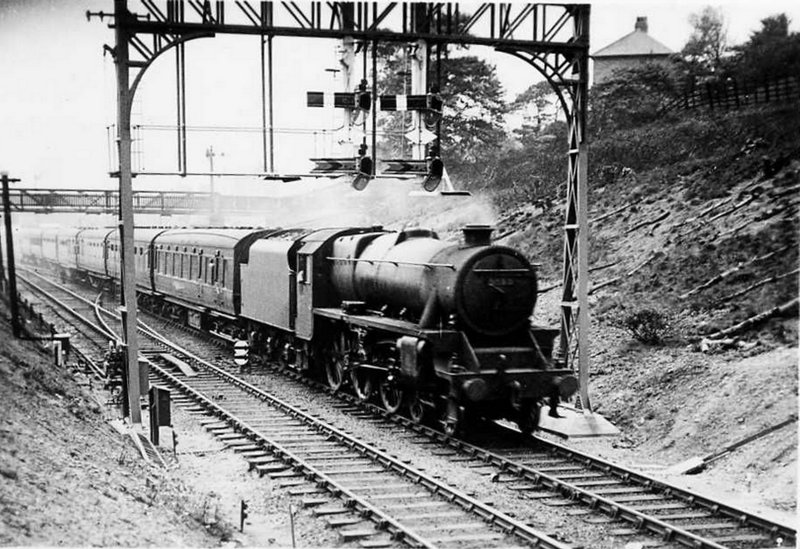 The Hall Royd signal gantry c. 1938 showing its L&NWR origins, although eretced by the LMS. Note the cluster of balance weights at the bottom of the left hand upright.