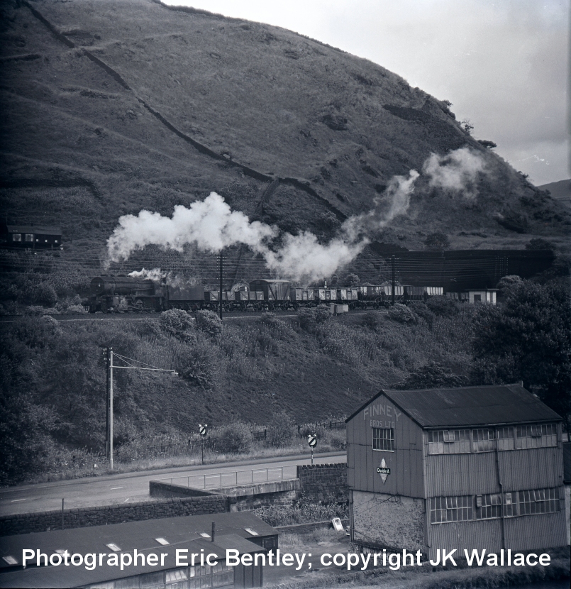 WD 2-8-0 90481 between Hebden Bridge & Todmorden exiting Horsefield Tunnel with a westbound mixed freight 30 July 1966. Photograher Eric Bentley, copyright JK Wallace