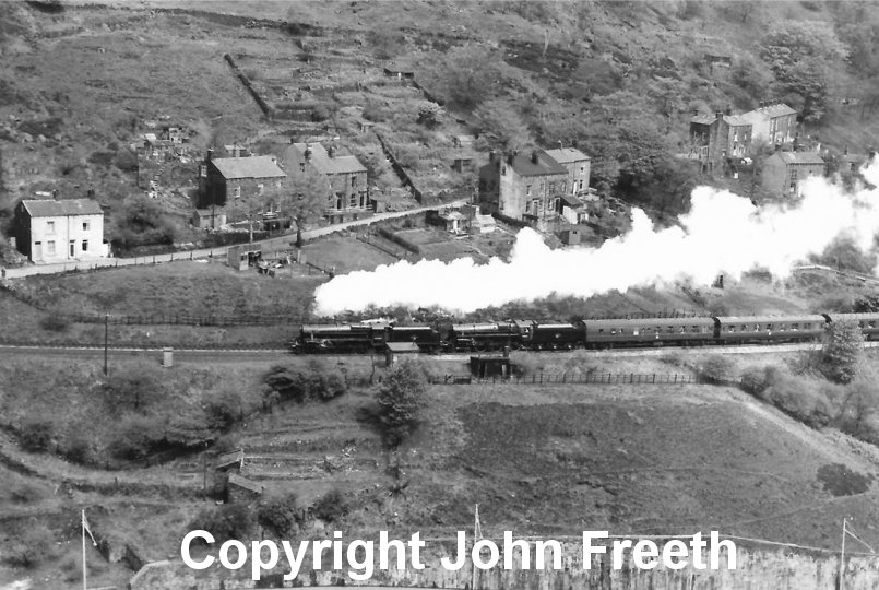 Black Five 44949 and Standard 5 73069 double head 1L66 the Warwickshire Railway Society "North Western Steam Tour" from Coventry, near Lydgate Viaduct on the climb to Copy Pit, on Saturday 18 May 1968. Photographer and copyright John Freeth