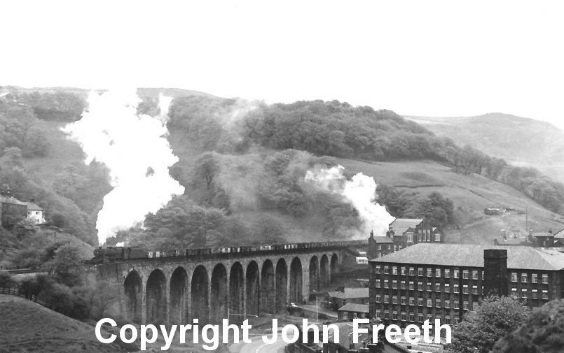 Stanier 8F 48410 crosses over Lydgate Viaduct on the climb to Copy Pit with the 9.00 Healey Mills to Rose Grove coal train on Saturday 18 May, 1968. The train was banked by 8F 48519. Photographer and copyright John Freeth