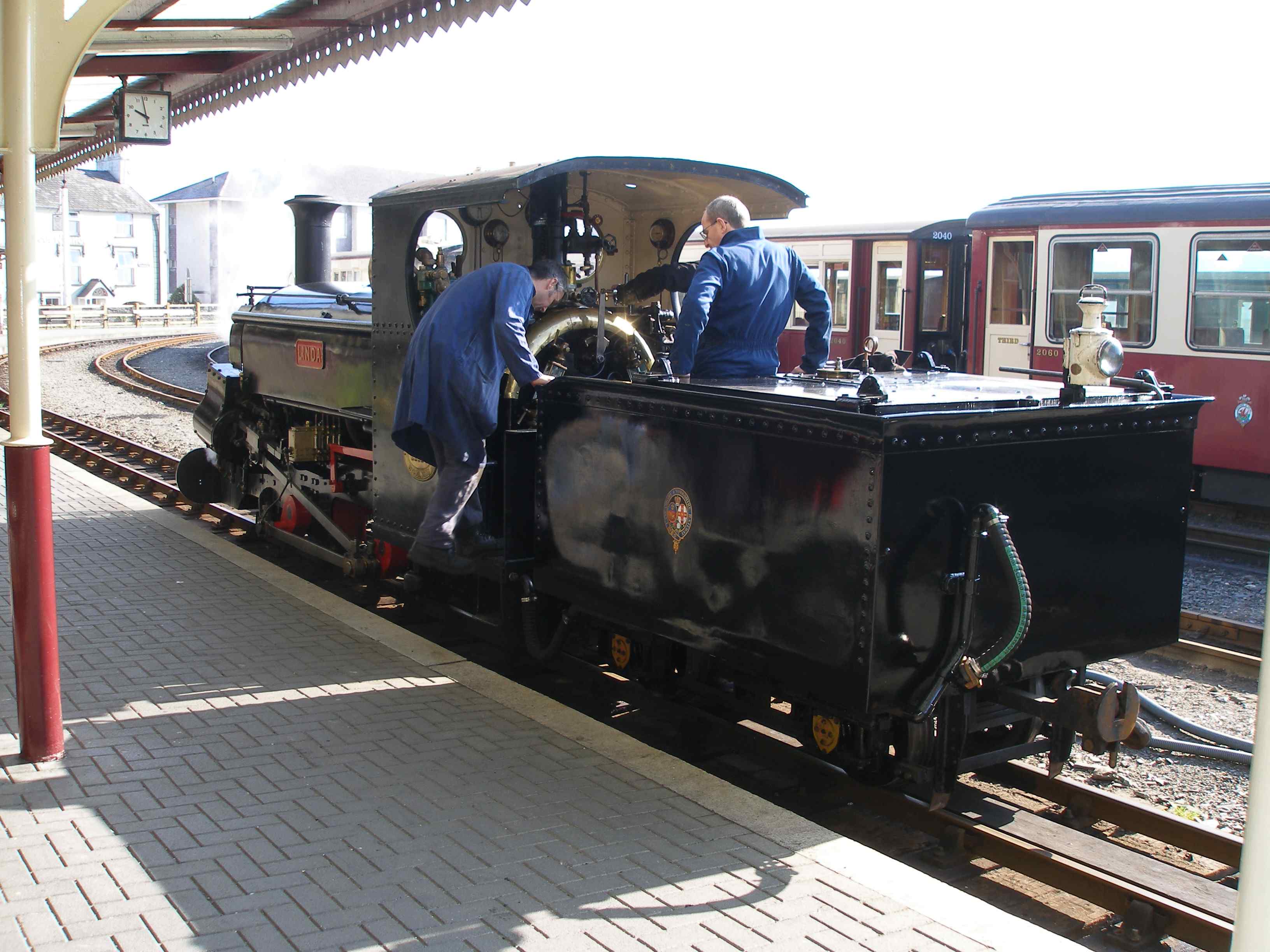 Sunday 26 March 2011 was again warm and sunny: in marked contrast to March 2013 which was one of the coldest on record! 'Linda' was this time allowed to assist with a UK Pathfinder special. The heraldic device on 'Linda's' tender definitely says 'Lancashire and Yorkshire Railway', and the loco is painted black... The L&YR did have a number of narrow-gauge systems, usually associated with its workshops. Horwich was the most well-known with its fleet of dedicated 18 inch gauge steam locos, and one of the locos survives. The Meols Cop electric deport in Southport also had a short length at the northern end of the complex. Although difficult to see, the safety valves have been moved back from the dome and now reside in the cab. 