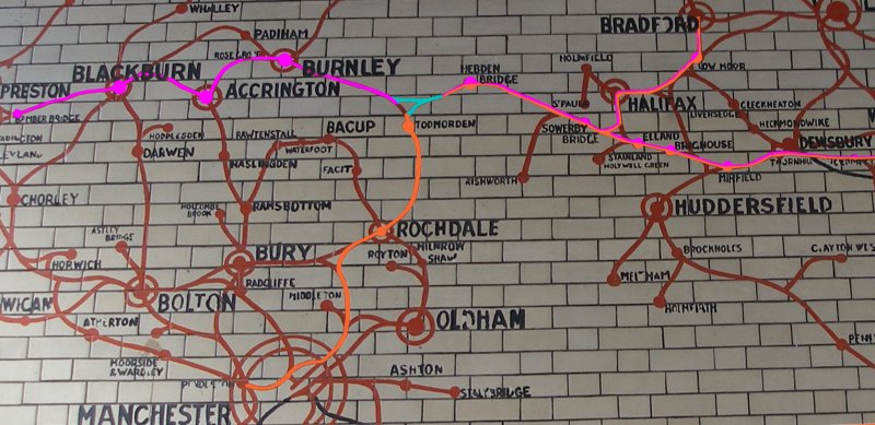 Manchester Victoria station tile map extract marked to show the location of Hall Royd Junction and primary traffic flows east to west.