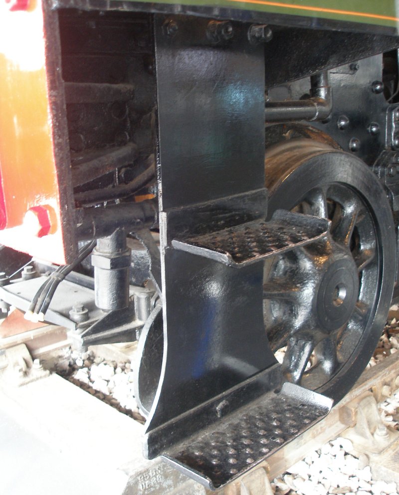 Stanier 'Coronation' Pacific 46235 'City of Birmingham' as seen in the ThinkTank Museum on 10 October 2015, showing the front footstep on the driver's side.