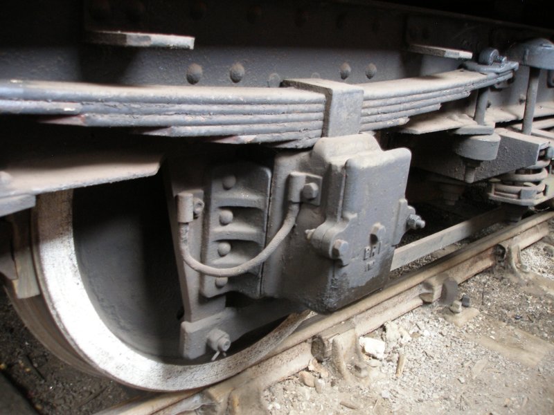 BR Mark 1 coach underframe detail: axle box showing spring stops and earthing cable