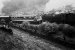 WD 90348 of Wakefield gets intimate with the ex-Devon Belle Observation Car passing Cornholme well on the way to Copy Pit. Steam from Mallard can be seen on the left hand side of the shot.