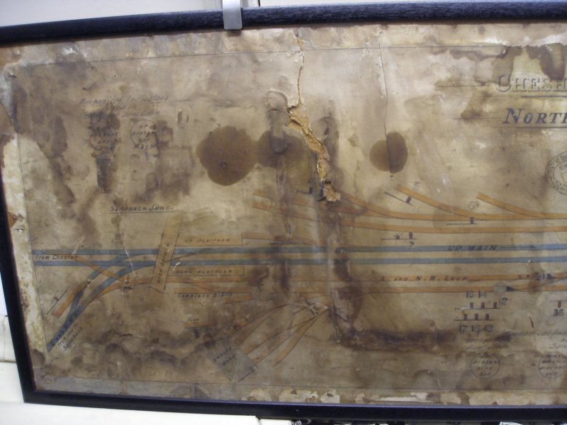 Signal box diagram for Northwich Central as seen at Mangapps Farm Railway Museum. The diagram is orientated east (left) to west (right) with the line from Sandbach  coming in at the bottom left hand corner where it joins the line from Chester and Mouldsworth at Sandbach Junction.