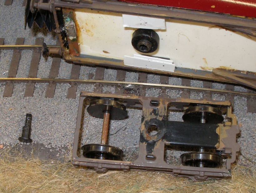 Airfix LMS coach upgrade using Bachmann bogies: Airfix bogie removed