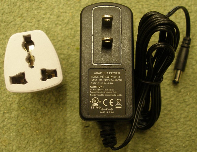 NCE Powercab USA-style power adapter and converter plug for the UK.