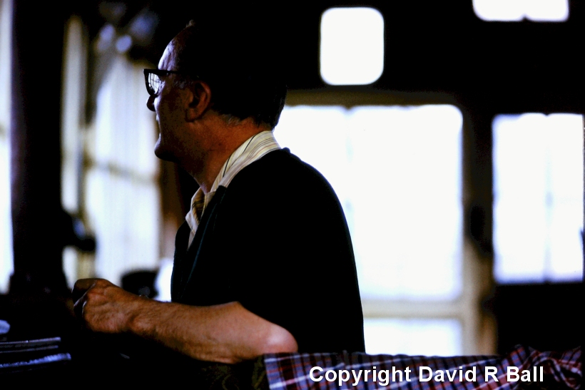 Sowerby Bridge signal box interior 1971 with signalman performing his duties.