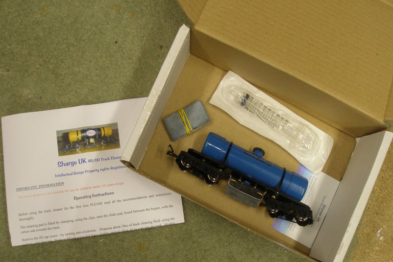 The Sharge UK track cleaner in its box.
