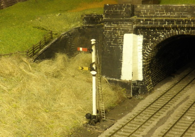 Hall Royd Junction signals 10 and 11 located at the mouth of Millwood Tunnel fashioned from a Hornby Dublo Home/Distant signal