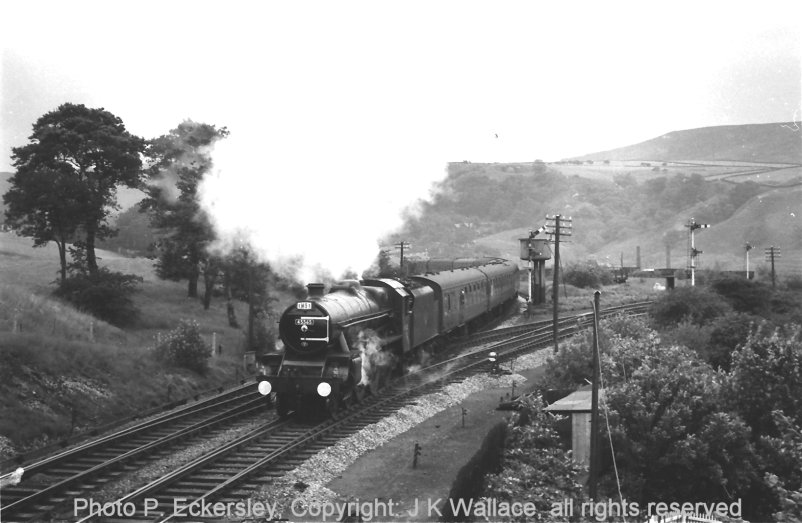 Stanier ex-LMS Jubilee 45565 'Victoria' gets away from Stansfield Hall Junction, Todmorden, having taking water there whilst heading special 1M91, assumed to be Blackpool bound, on 23 July 1966