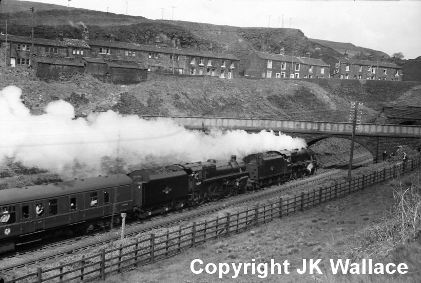 BR Standard 73069 and Stanier Black 5 44949 appraoch Summit West tunnel on 18 March 1968.