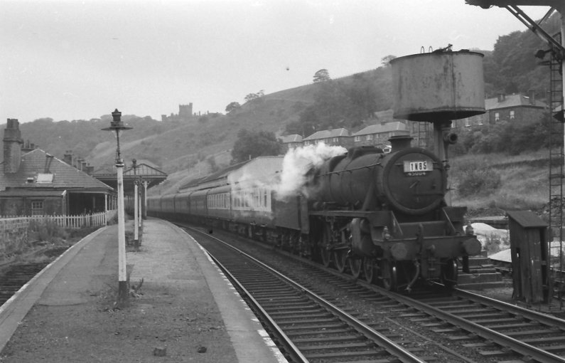 Black 5 45404 is seen at Todmorden Platform 2 with returning excursion 1N85 in 1966.