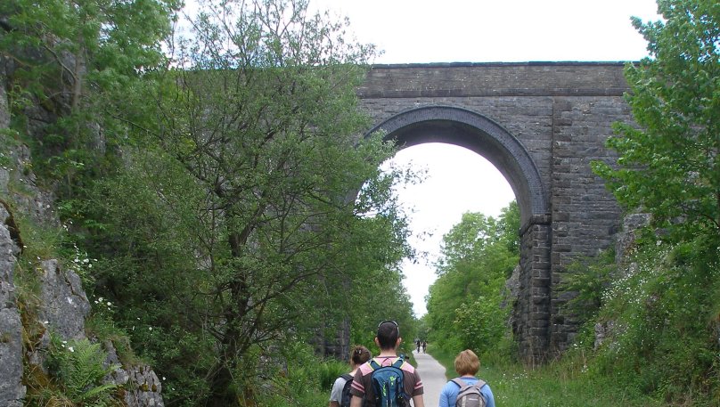 Tall bridge in rock cutting on the ex-LNWR line from Boxton to Ashbourne.