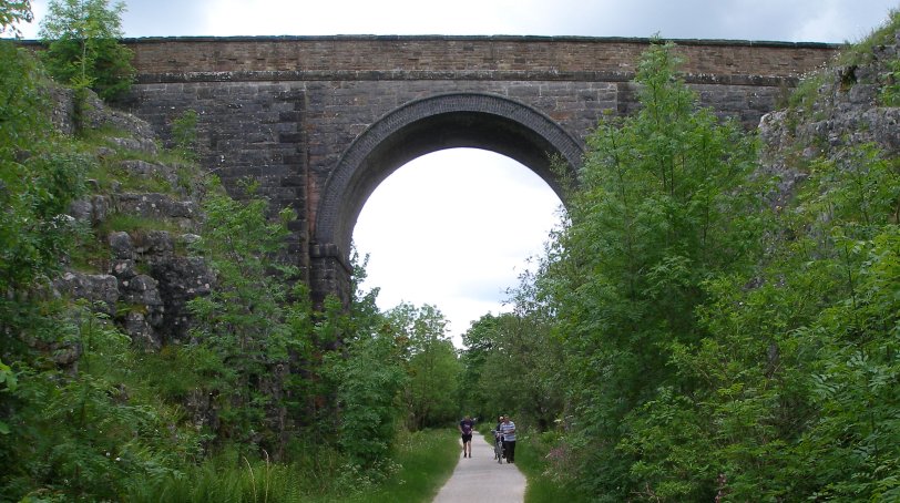 Tall bridge in rock cutting on the ex-LNWR line from Boxton to Ashbourne.