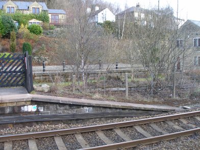 Todmorden Railway Station: Platform 2 eastward end ramp taken from Platform 1 on 19 April 2013