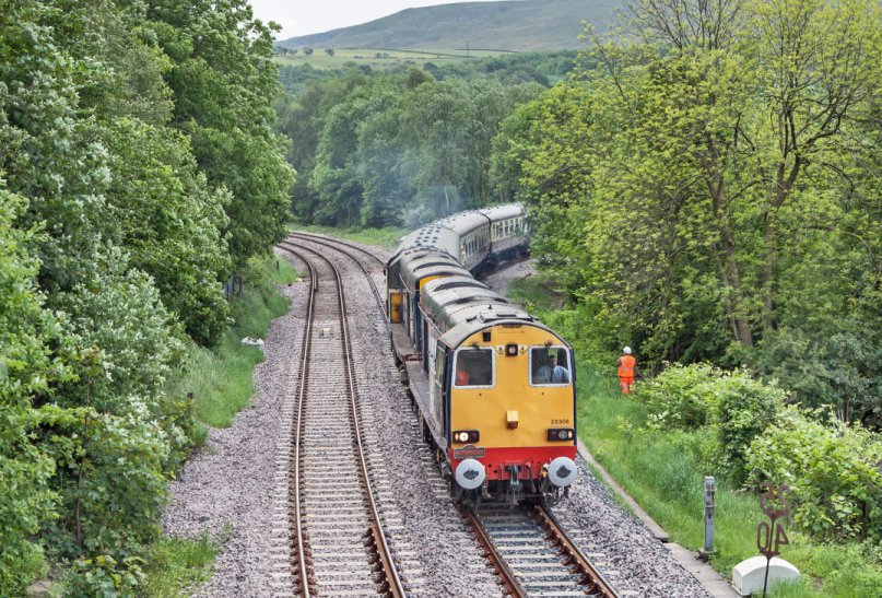 The Topper Chopper special leaves the new curve at Todmorden and joins the Up East Lancs line heading towards Copy Pit and Blackburn on 31 May 2014.