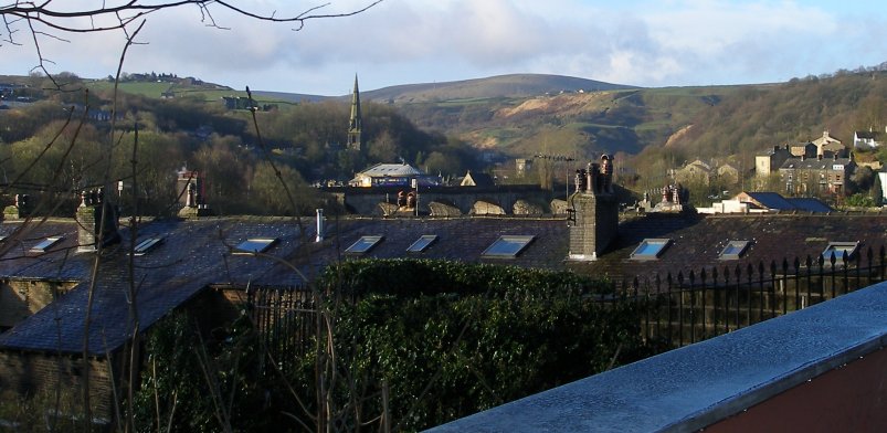 Train crossing the viaduct at Todmorden as seen from Stansfield Hall Junction footbidge 22 March 2014