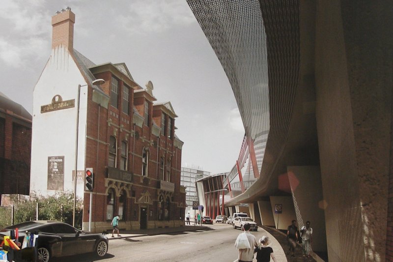 Manchester Victoria Railway Station 11 April 2015 on the occasion of a guided tour organised by the Lancashire & Yorkshire Railway Society:  showing artist's impression of extended platforms 15 & 16 at Manchester Piccadilly, and coicidentally, part of the wall of the old suburban Mayfield Station.