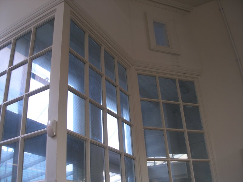 Manchester Victoria Railway Station 11 April 2015 on the occasion of a guided tour organised by the Lancashire & Yorkshire Railway Society: small office windows inside the booking office