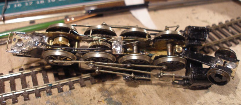 Underside of DJH 2-8-0 chassis showing Portescap gearbox and old gear wheel.